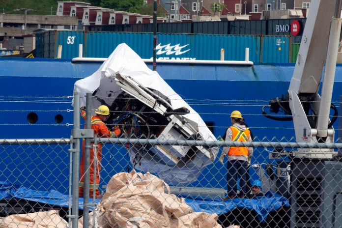 imploded-titanic-submarine-seen-for-first-time-as-pieces-recovered-from-sea-floor