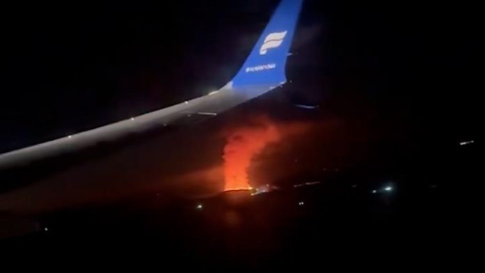 iceland’s-volcano-eruption-seen-from-plane-window-in-passenger-footage